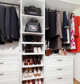 a-closet-with-a-lot-of-shoes-and-handbags.jpg A closet with a lot of shoes and handbags